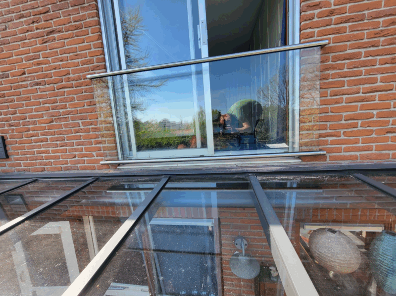 Frans balkonhek met glas en RVS