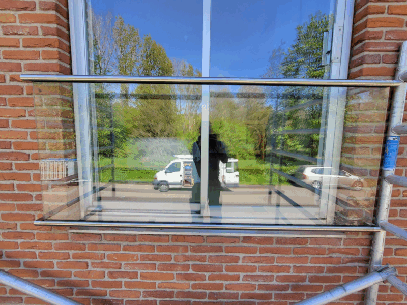 Frans balkonhek met glas en RVS