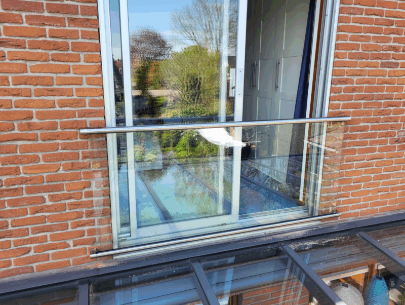 Frans balkonhek met glas en RVS