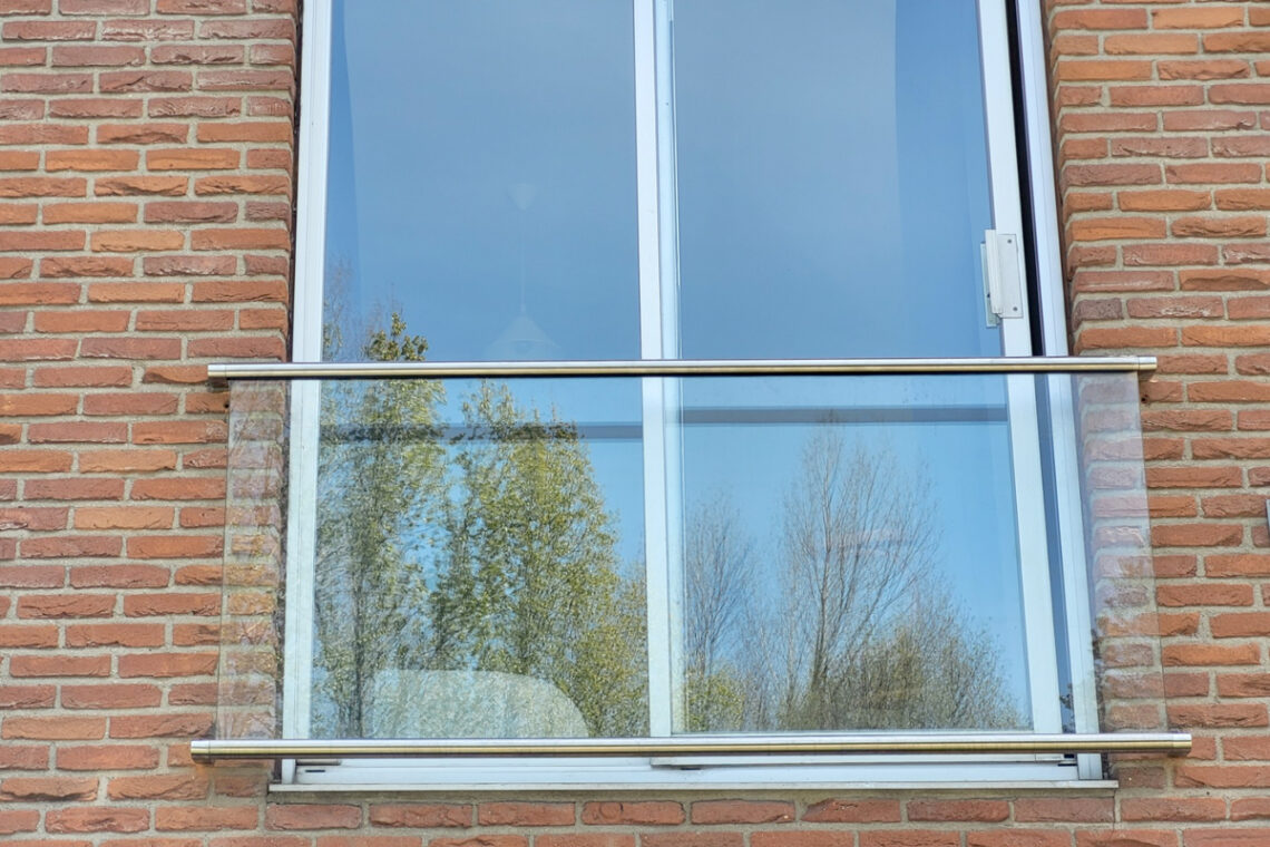 Frans balkonhek met glas op maat