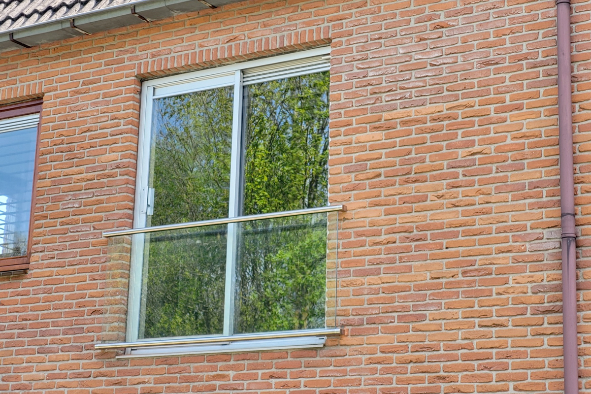 Hoeveel kost een Frans balkonhek met glas?