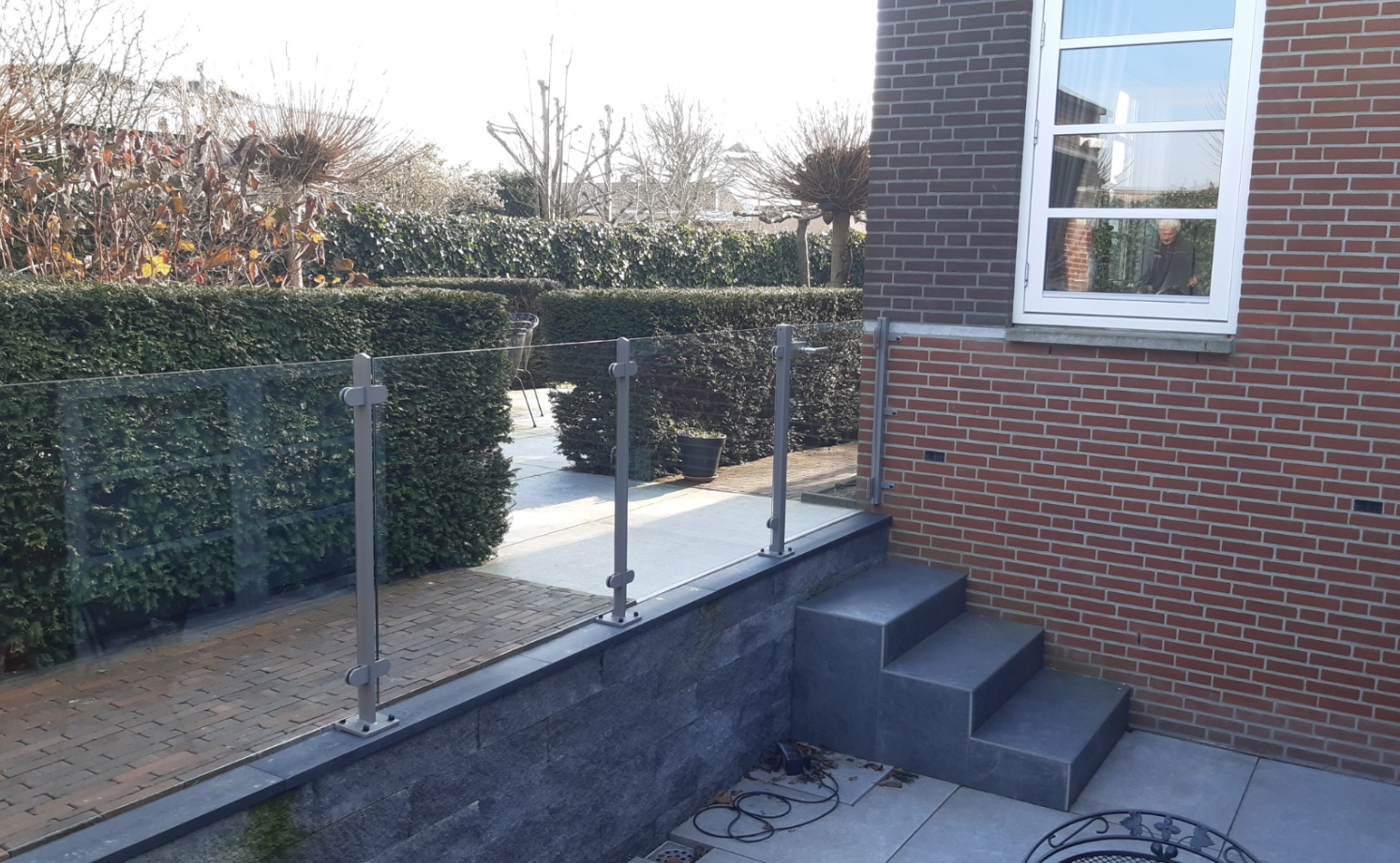 Hekwerk met glas in je tuin plaatsen