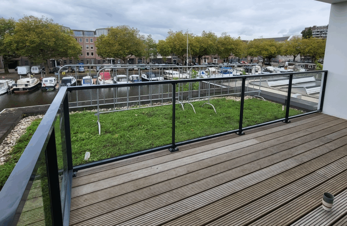 Hekwerk met glas voor dakterras