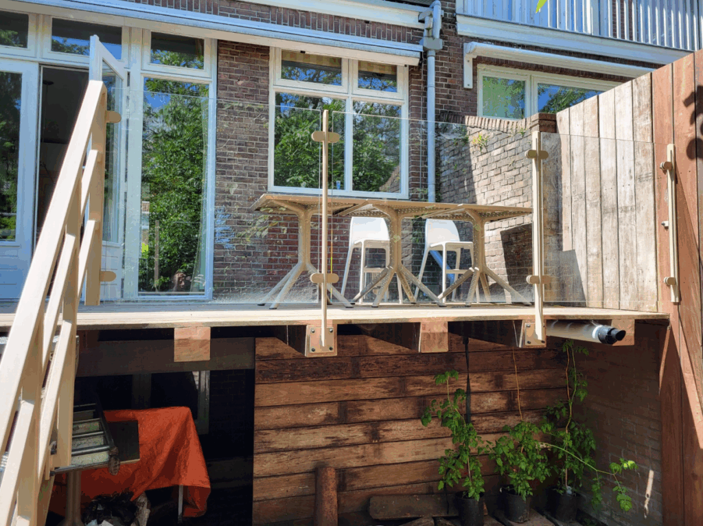 Stalen balustrade met glas op maat